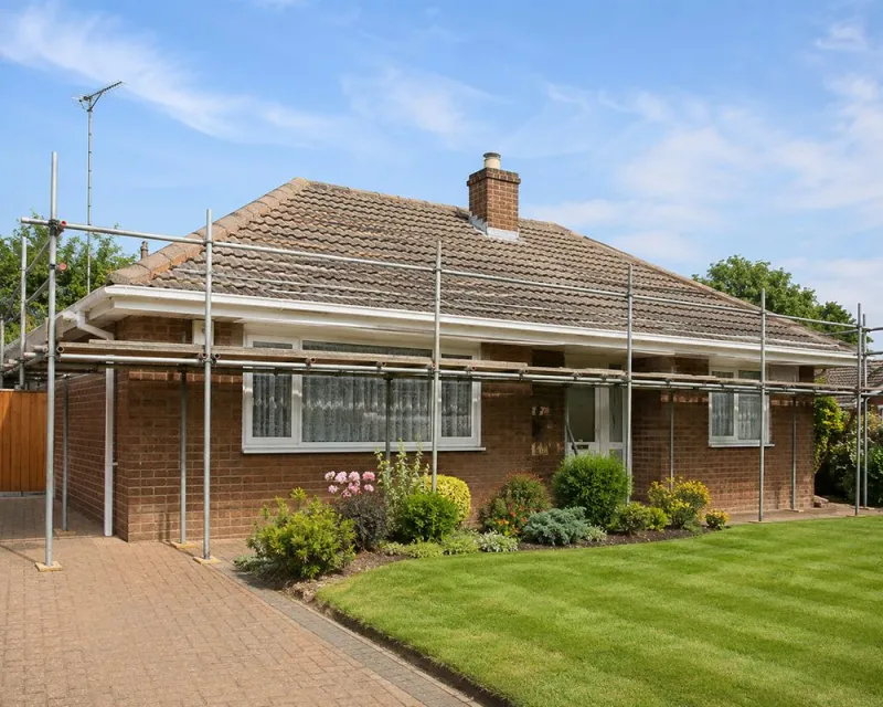 Low-level scaffolding around a bungalow