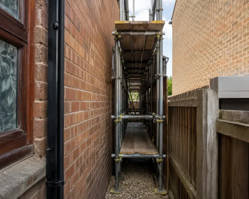 Scaffolding fitted into a narrow side access